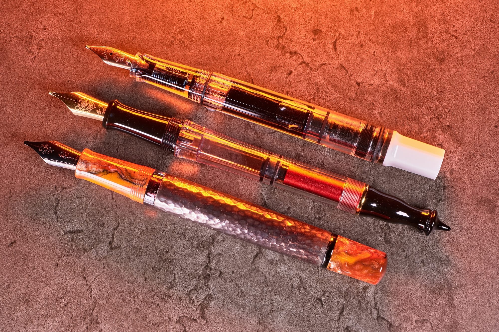 Photo of 3 different types of piston filling fountain pens